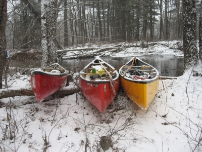 Three Canoes in the Snow