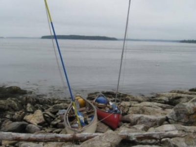 Two Old Canoes on and island in Maine